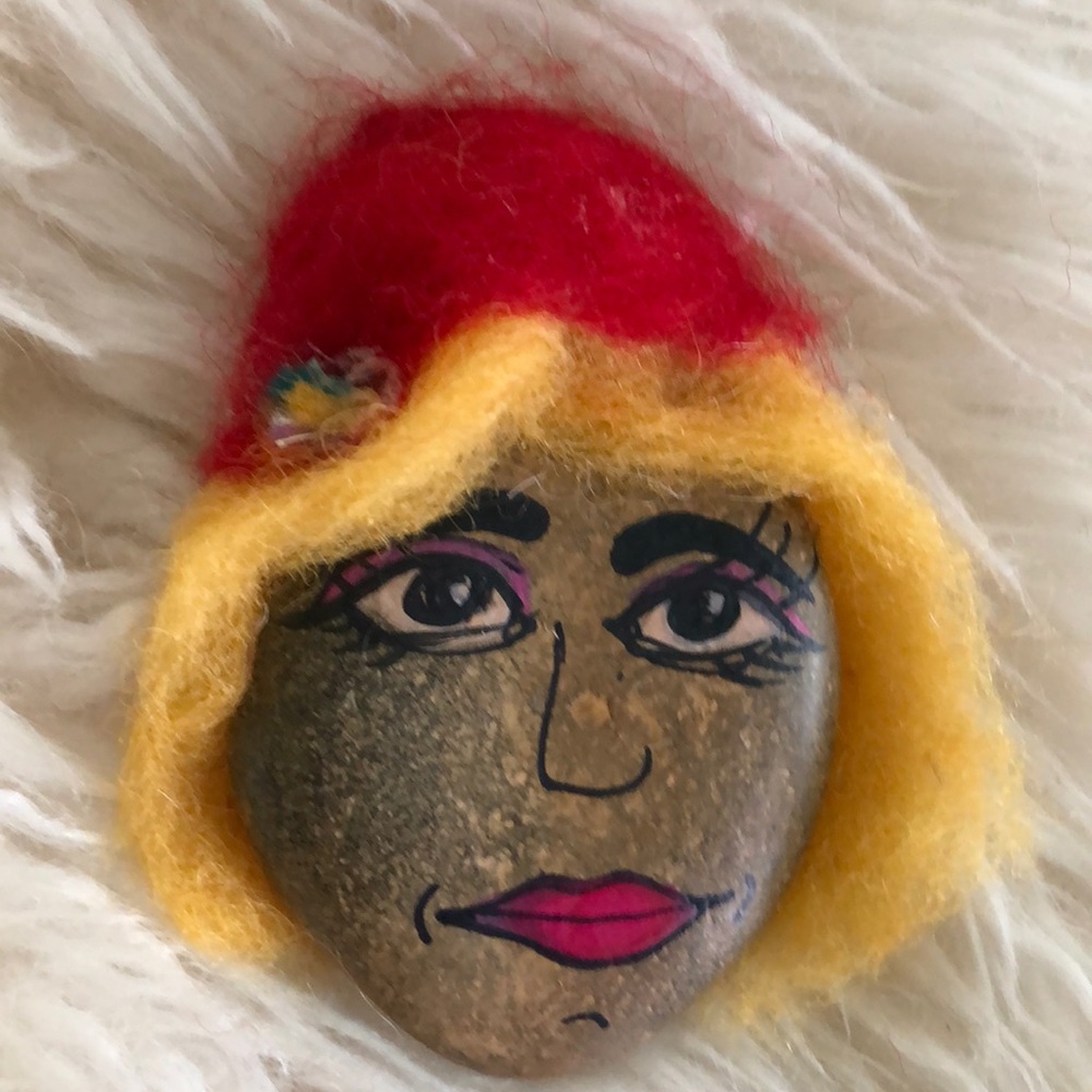 Faces painted on rocks,wool hair and hats designed